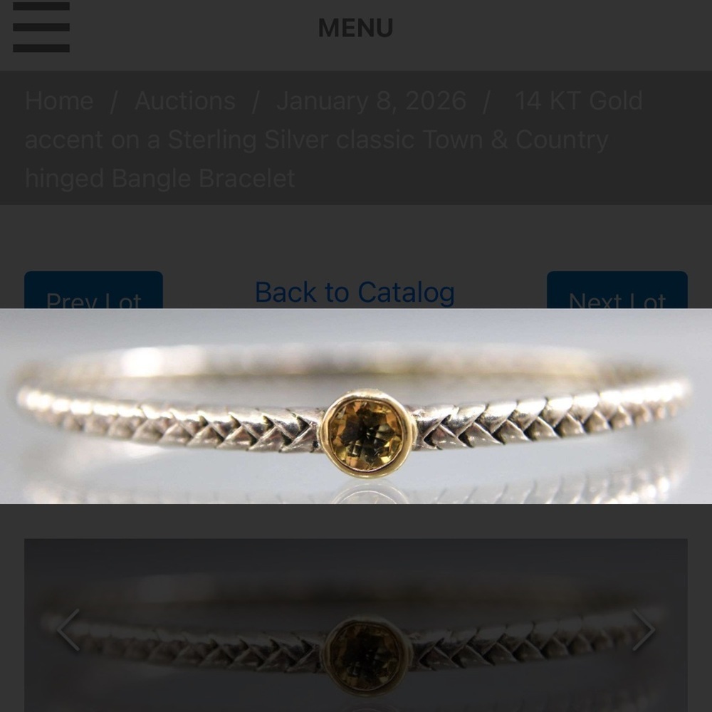 14 KT Gold accent on a Sterling Silver classic Town & Country hinged Bangle